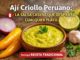 salsa ají criollo peruano casera con ají amarillo, limón y cebolla en bowl sobre mesa rústica lista para acompañar comidas